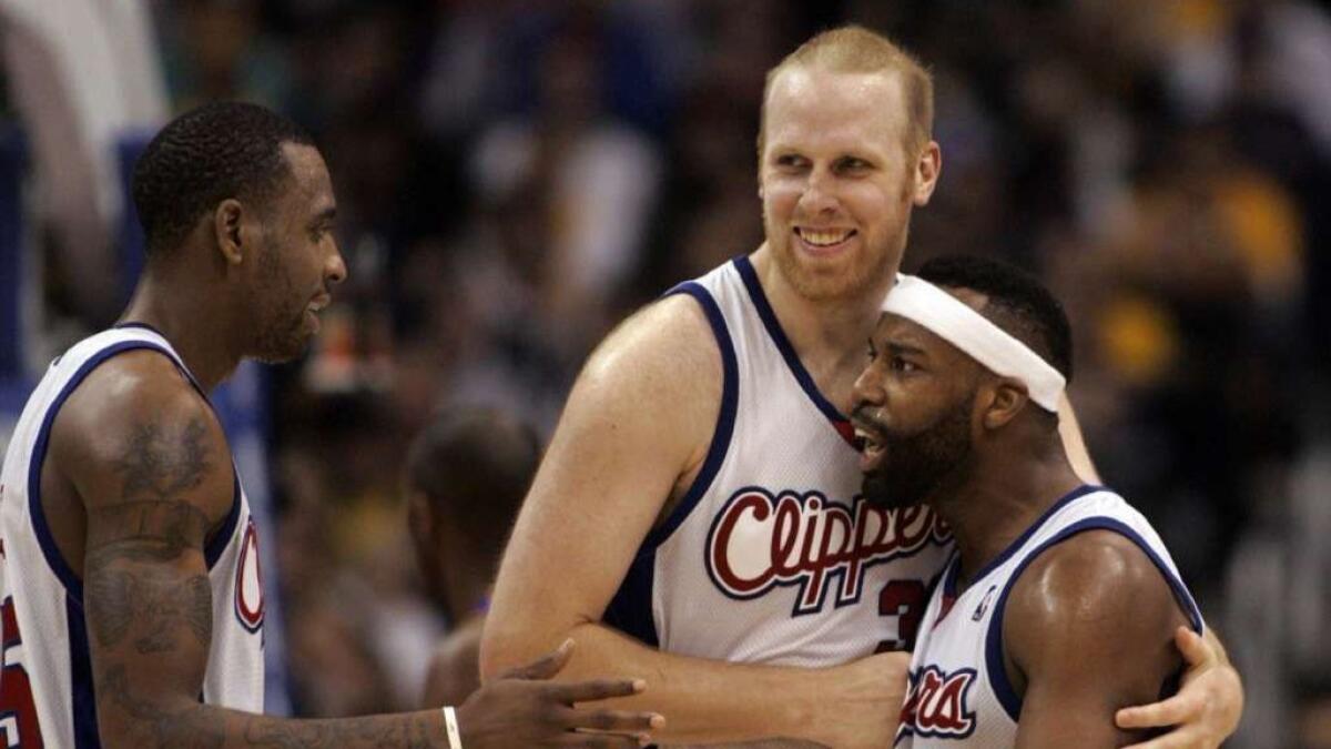 Former Clippers big man Chris Kaman, center, listed an oceanfront home in the Carpinteria area for sale at $4.4 million.