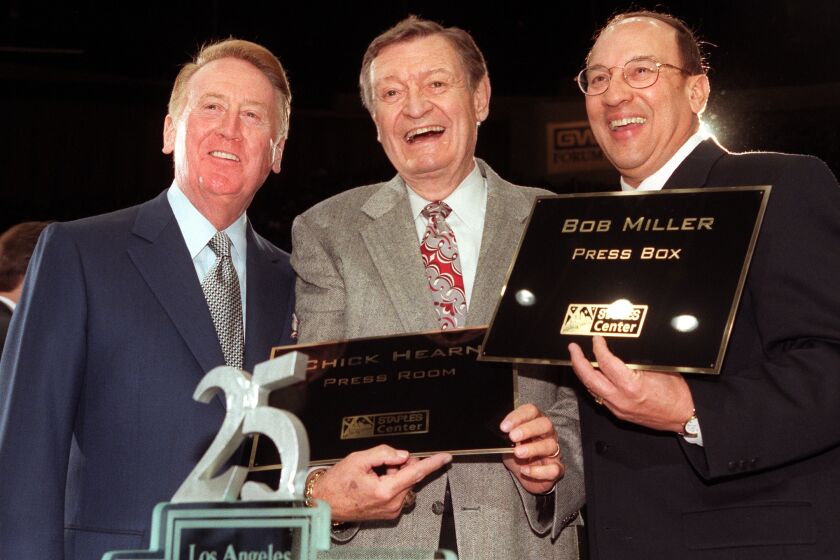 Vin Scully, Chick Hearn and BobMiller togather celebrating Bob Miller's 25th year.