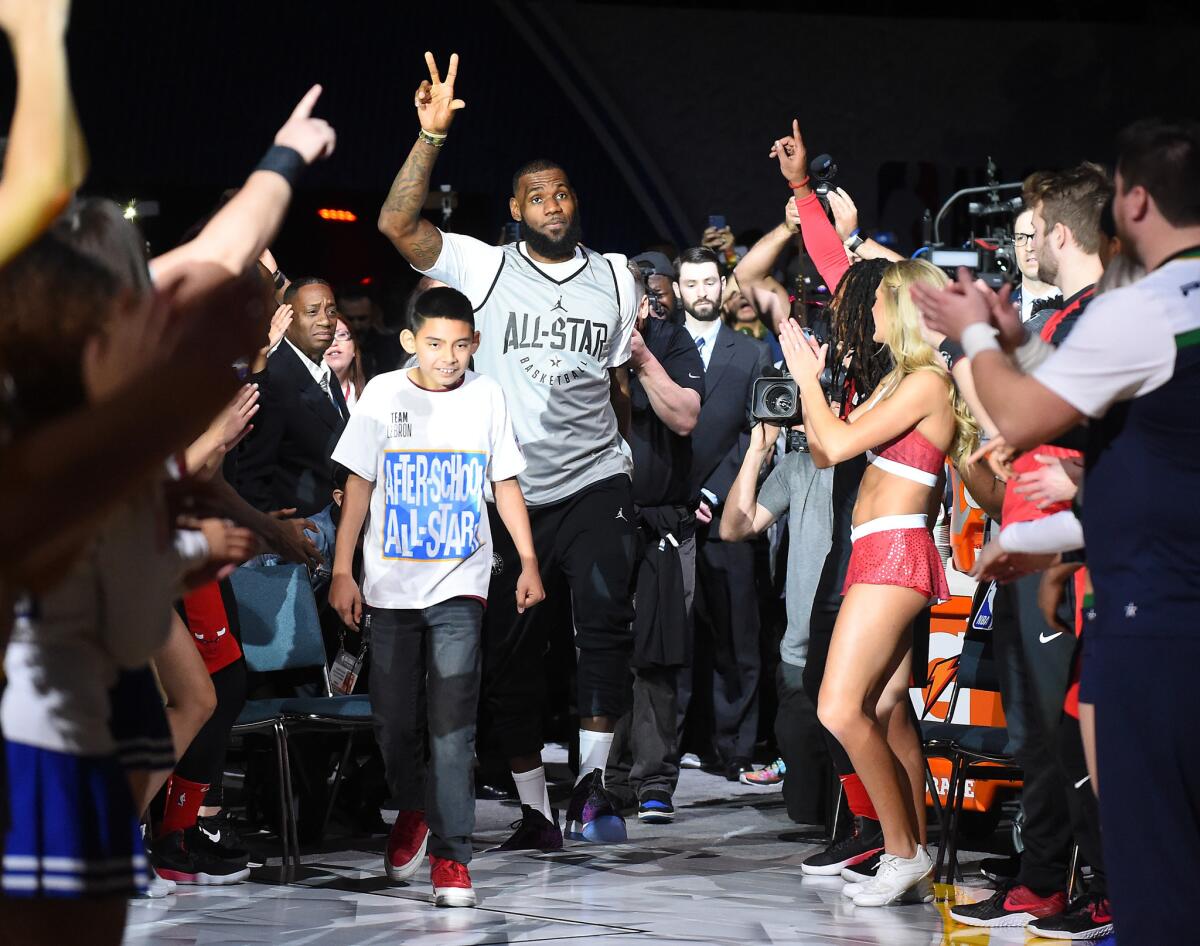 LeBron James is introduced before All-Star practice on Saturday at the L.A. Convention Center.