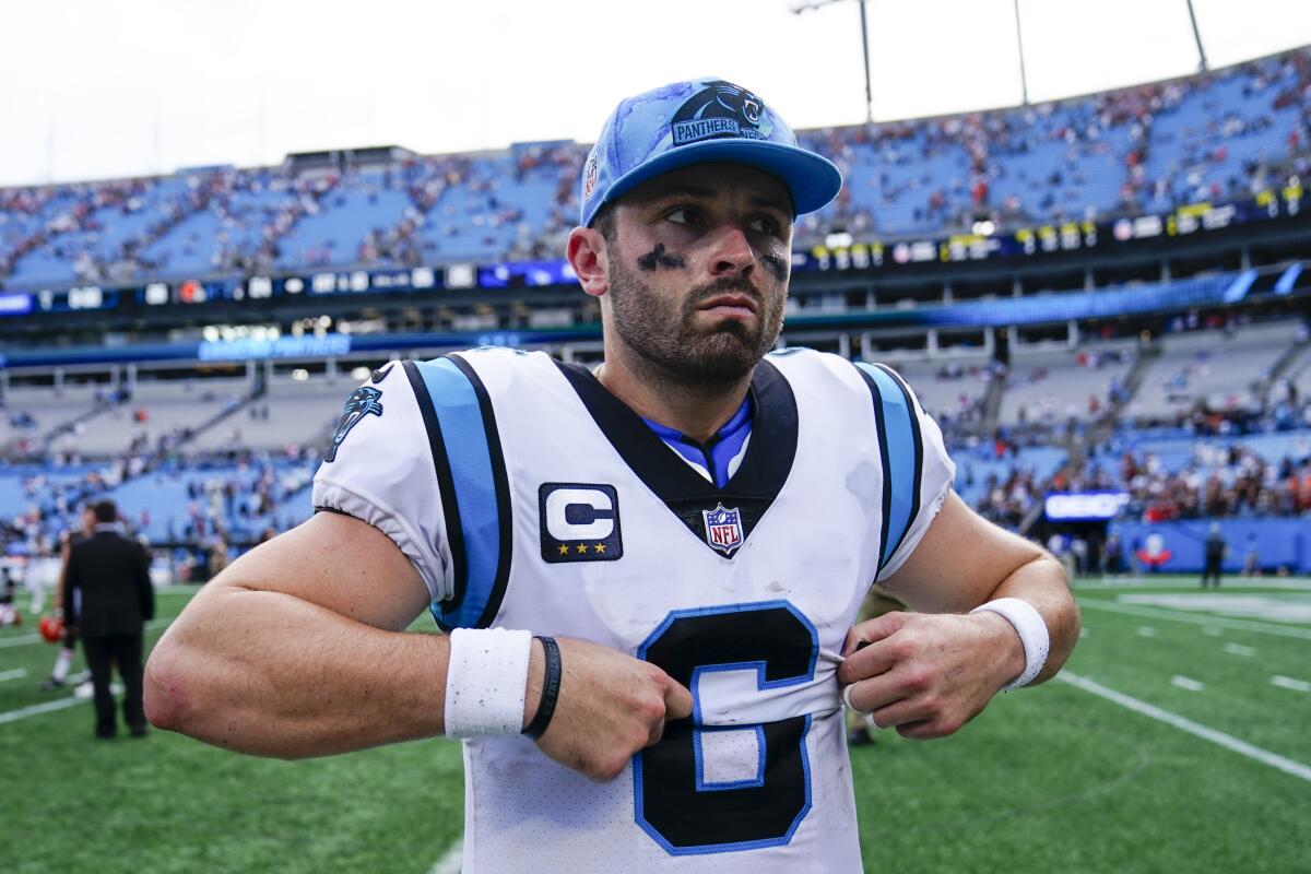 Carolina Panthers quarterback Baker Mayfield leaves the field after their loss against the Cleveland Browns during an NFL football game on Sunday, Sept. 11, 2022, in Charlotte, N.C. (AP Photo/Jacob Kupferman)