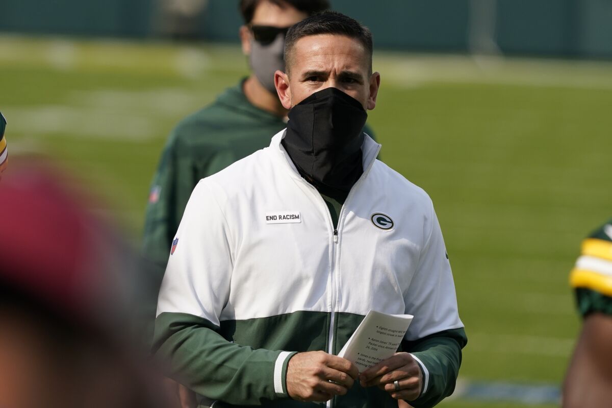 Green Bay Packers head coach Matt LaFleur walks off the field after an NFL football game against the Detroit Lions Sunday, Sept. 20, 2020, in Green Bay, Wis. The Packers won 42-21. (AP Photo/Morry Gash)