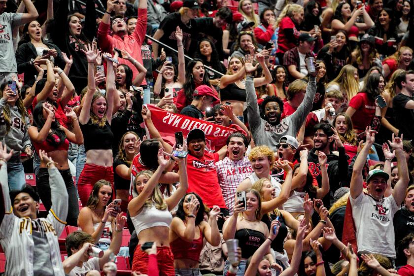 San Diego, CA - April 3: San Diego State fans cheer at a watch party at Viejas Arena during the first half of the national championship game of the 2023 NCAA Men's Basketball Tournament played between the San Diego State Aztecs and the Connecticut Huskies. (Nelvin C. Cepeda / The San Diego Union-Tribune)