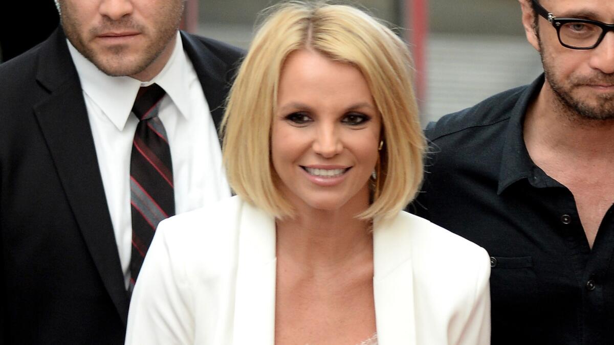 Britney Spears debuts a bob haircut at the CentrO shopping mall in Oberhausen, Germany.