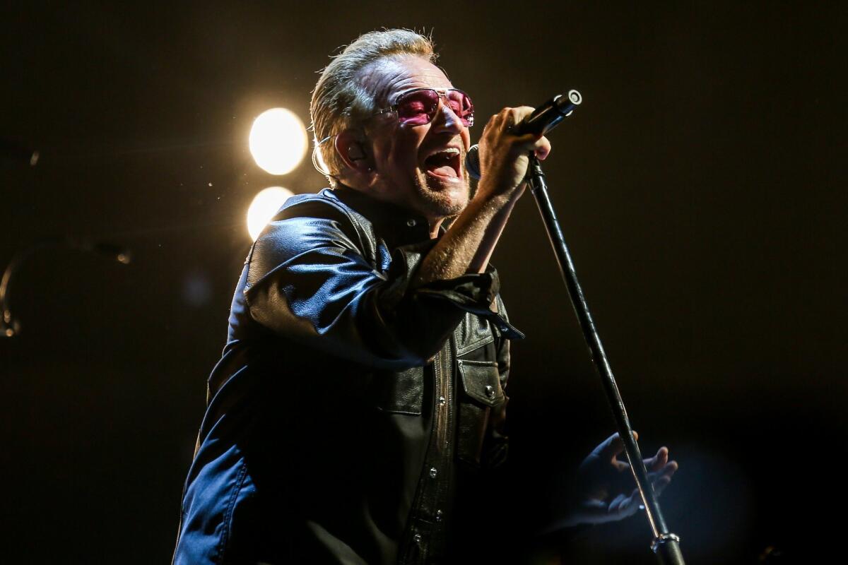 Bono performs at U2's Innocence + Experience Tour at the Forum on May 26.