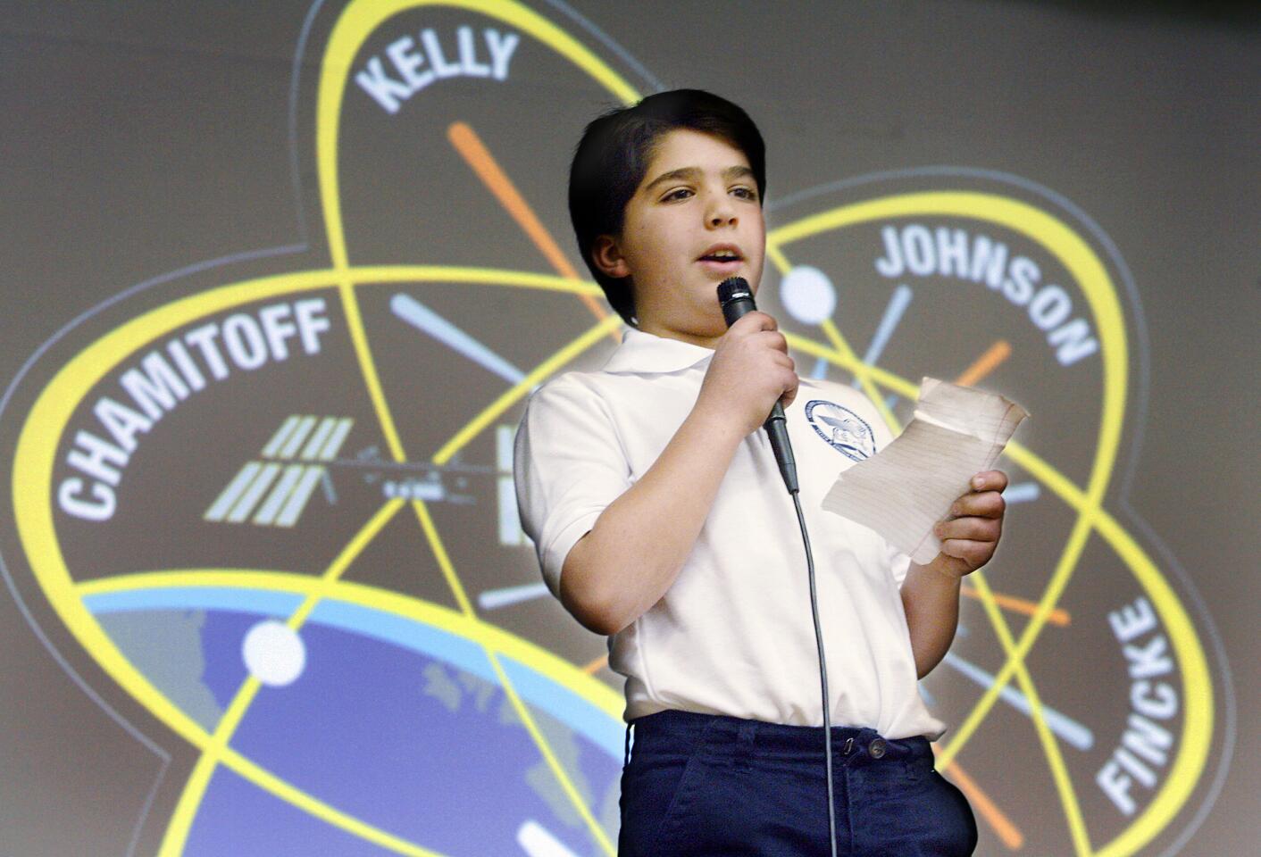 Fourth grade student Shant Armenian, 9, of Altadena, talks to his fellow students about bringing astronaut Gregory Errol Chamitoff to Vahan & Anoush Chamlian Armenian School in Glendale on Friday, January 13, 2012 to talk to the students. Armenian is a member of the Astronomy Club in Burbank who sent a letter to U.S. Congressman Adam Schiff asking if an astronaut could visit the school. Astronaut Gregory Errol Chamitoff, who was part of Space Shuttle mission STS 134 visited and told students about the mission.