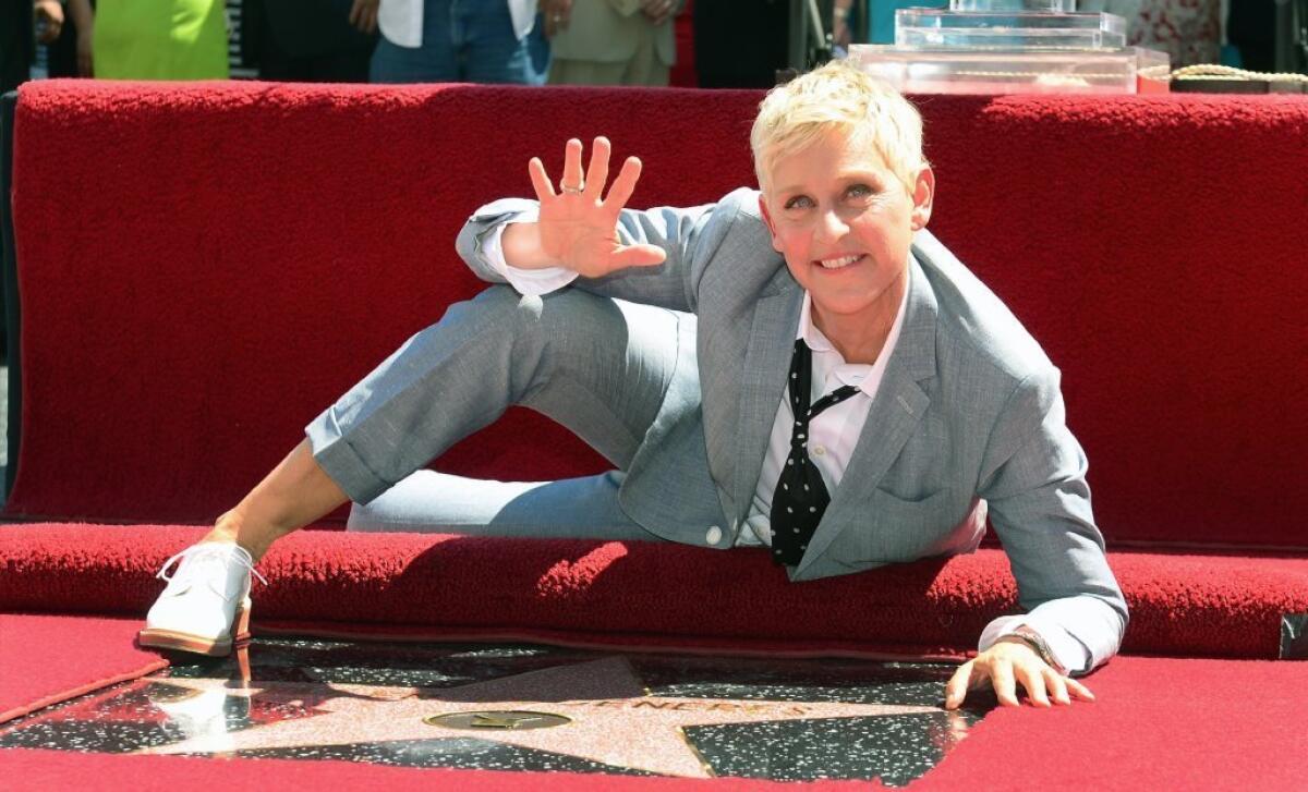 Ellen DeGeneres, posing with her Hollywood Walk of Fame star last year, will be returning to host the Academy Awards in 2014.