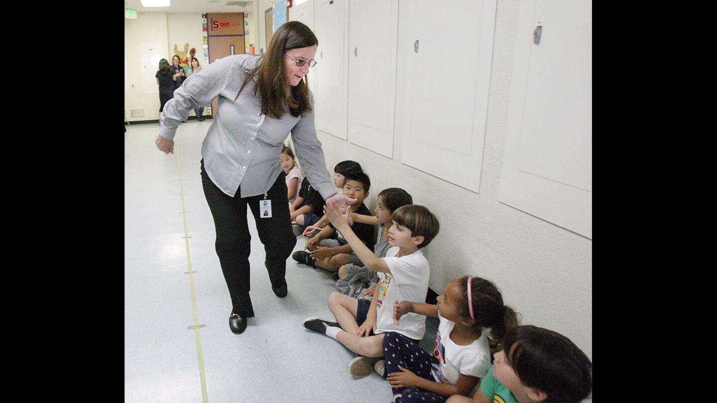 Photo Gallery: Hoover graduating seniors visit elementary and middle school students to inspire