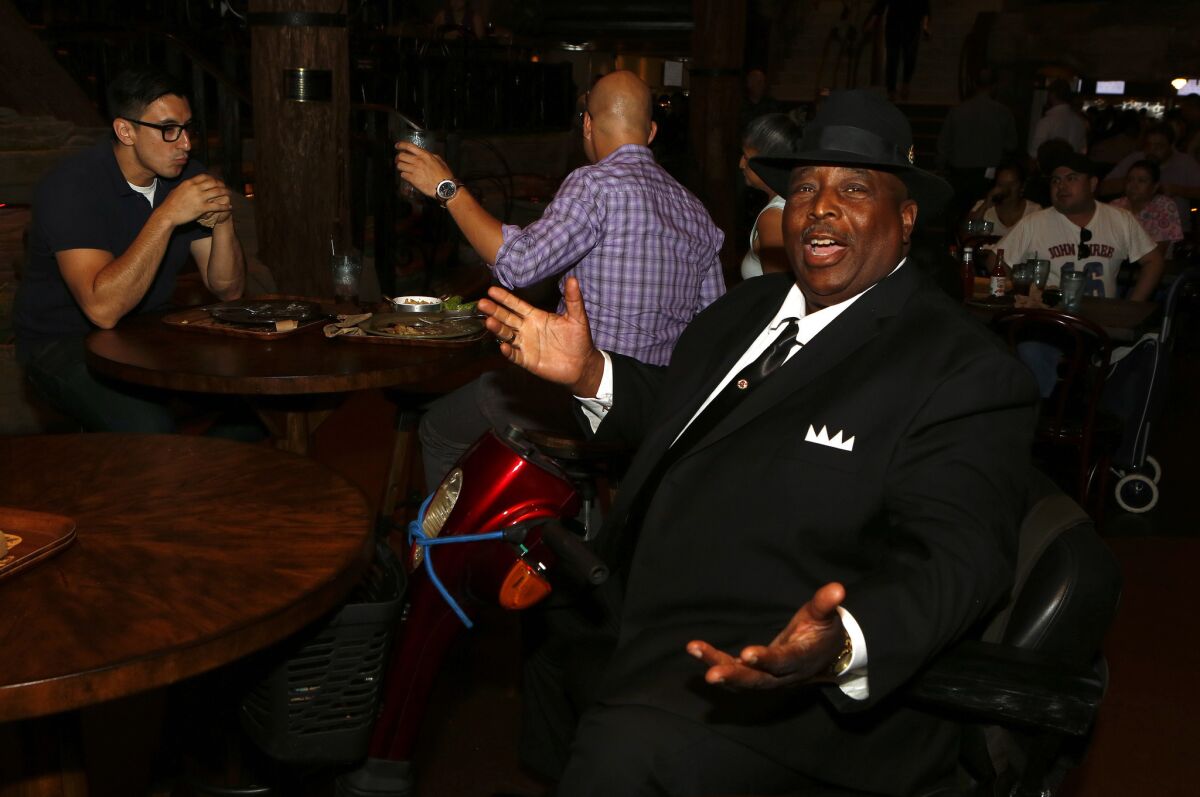 Michael "Big Mike" Goodloe, 65, of Los Angeles, is dressed for the occasion inside Clifton's cafeteria on Broadway in downtown Los Angeles.