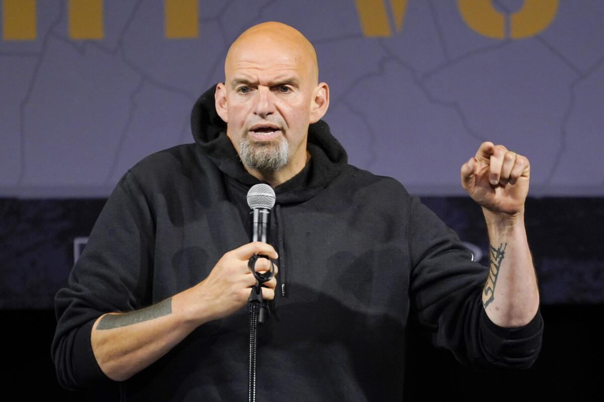 FILE - Pennsylvania Lt. Gov. John Fetterman, the Democratic nominee for the state's U.S. Senate seat, speaks during a rally in Erie, Pa., Aug. 12, 2022. Fetterman has made abortion rights a prominent theme in the suburbs to invigorate female voters after the U.S. Supreme Court overturned Roe v. Wade in June. (AP Photo/Gene J. Puskar, File)