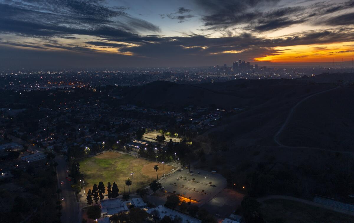 An aerial view of a park at dusk