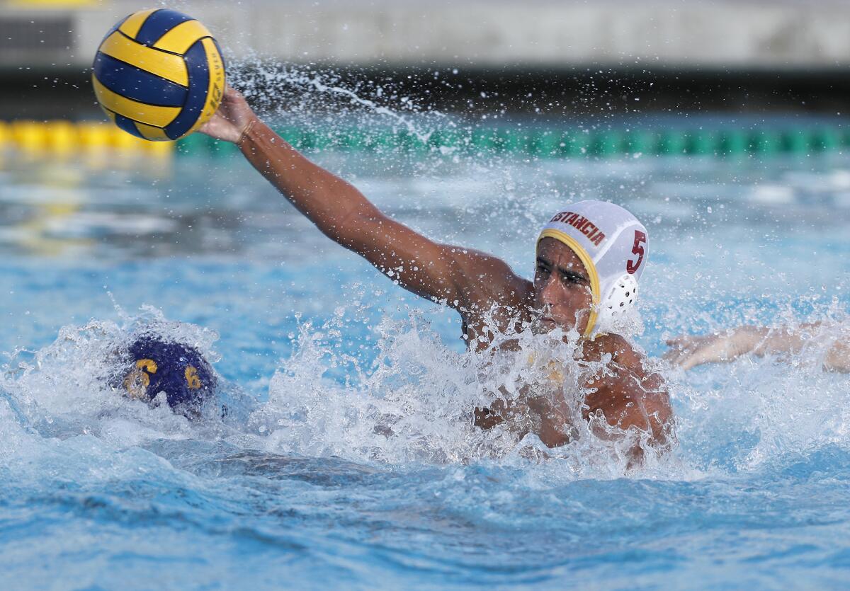 Estancia's Matthew Kehoe (5) shoots against Marina in the second half of a nonleague match at Westminster High on Wednesday.