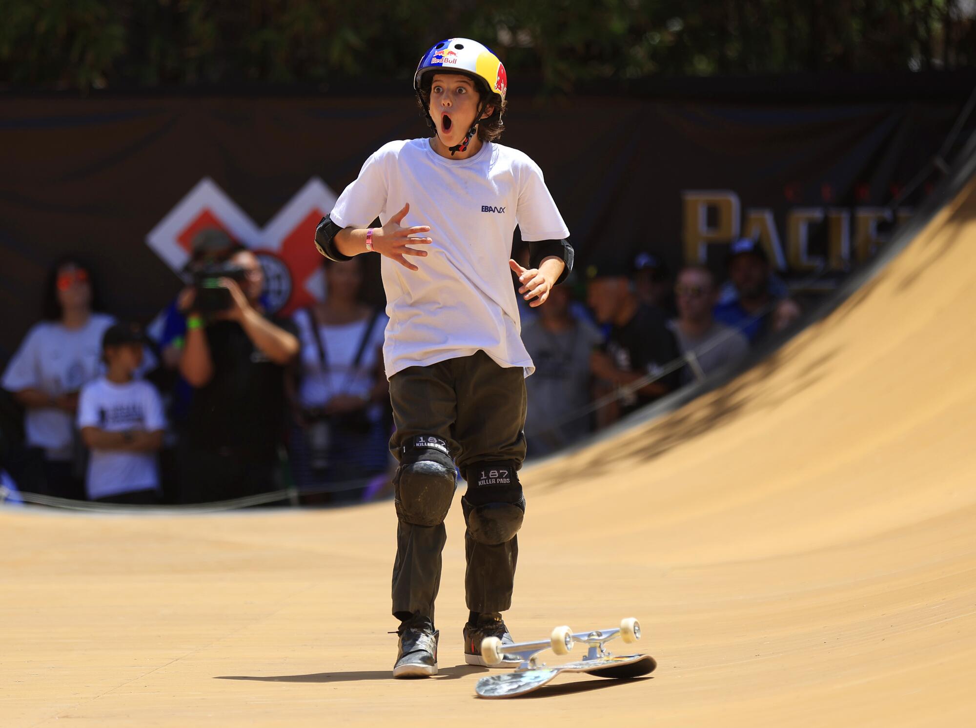 Gui Khury reacts after falling on a trick during the skateboard vert trick competition in the X Games.