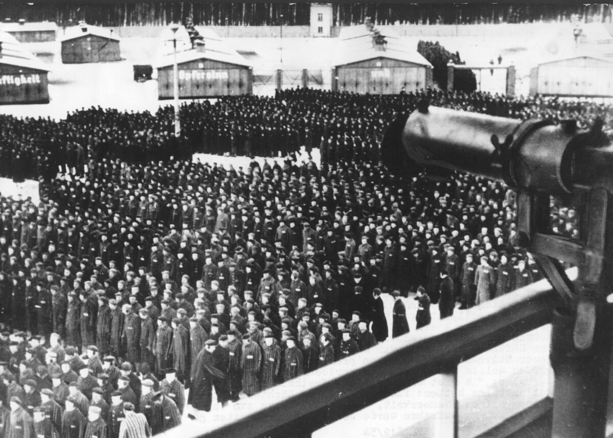 Prisoners massed for roll call in Nazi concentration camp