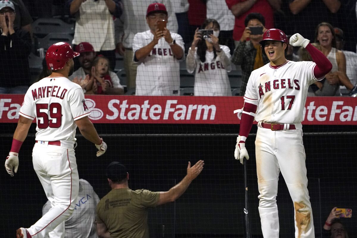 Shohei Ohtani pitched seven innings and Jack Mayfield hit a home run in the Angels win Monday. (AP Photo/Mark J. Terrill)