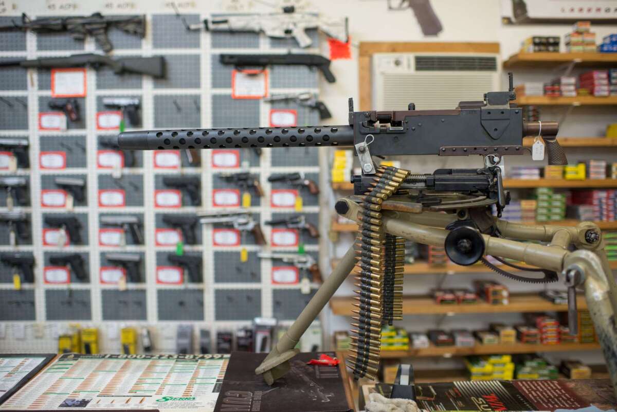 Various weapons are on display at Roseburg Gun Shop in Roseburg, Ore. Oct. 2, the day after the town saw a deadly shooting take place at nearby Umpqua Community College.