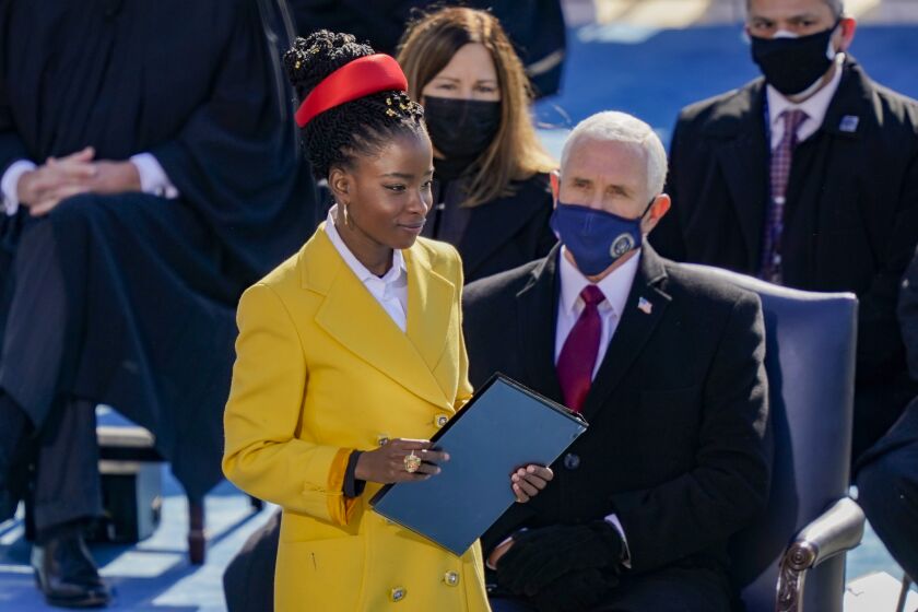 WASHINGTON, DC - JANUARY 20: Poet Laureate Amanda Gorman prepares to speak at the inauguration of U.S. President Joe Biden on the West Front of the U.S. Capitol on January 20, 2021 in Washington, DC. During today's inauguration ceremony Joe Biden becomes the 46th president of the United States. (Photo by Drew Angerer/Getty Images)