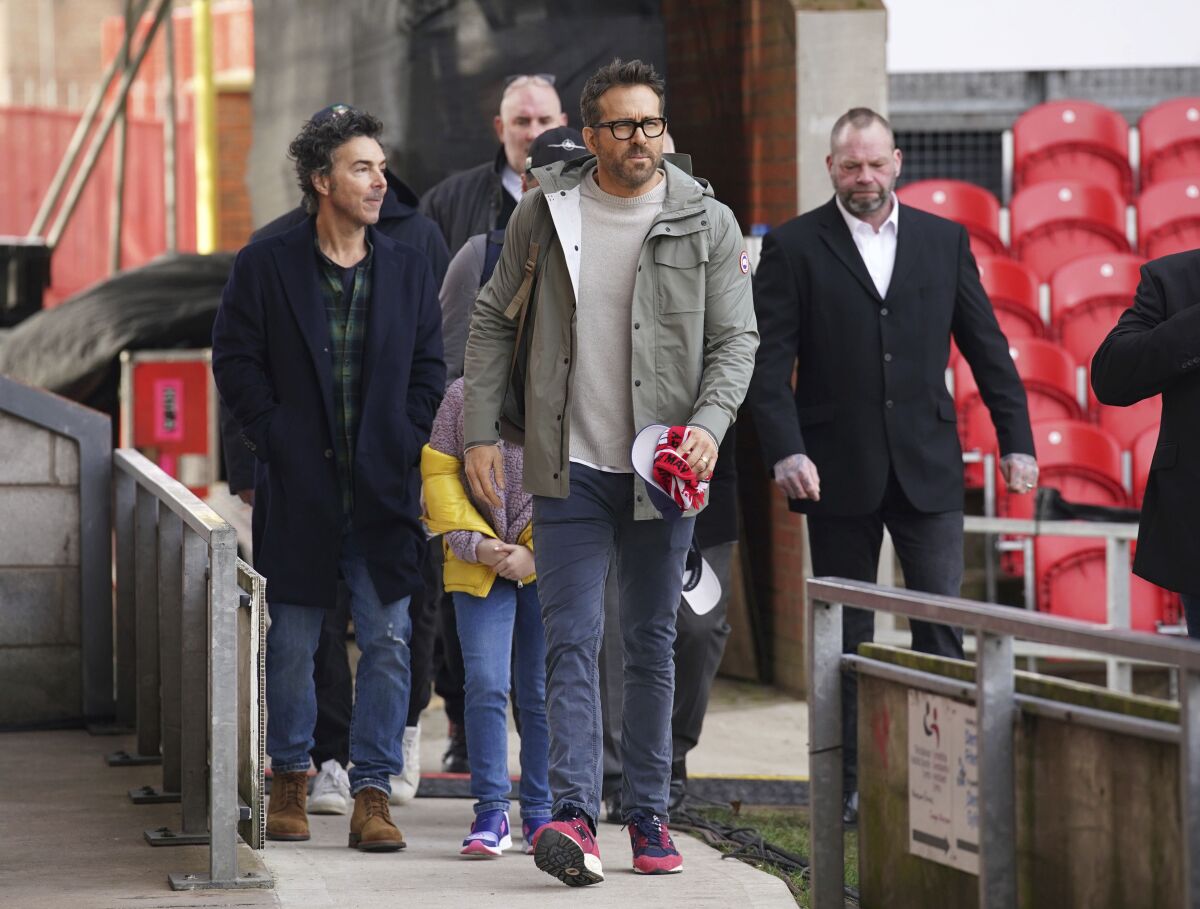 Wrexham co-owner, actor Ryan Reynolds arrives prior to the English FA Cup 4th round Soccer match between Wrexham and Sheffield United at The Racecourse Ground, in Wrexham, England, Sunday, Jan. 29, 2023. (Peter Byrne/PA via AP)