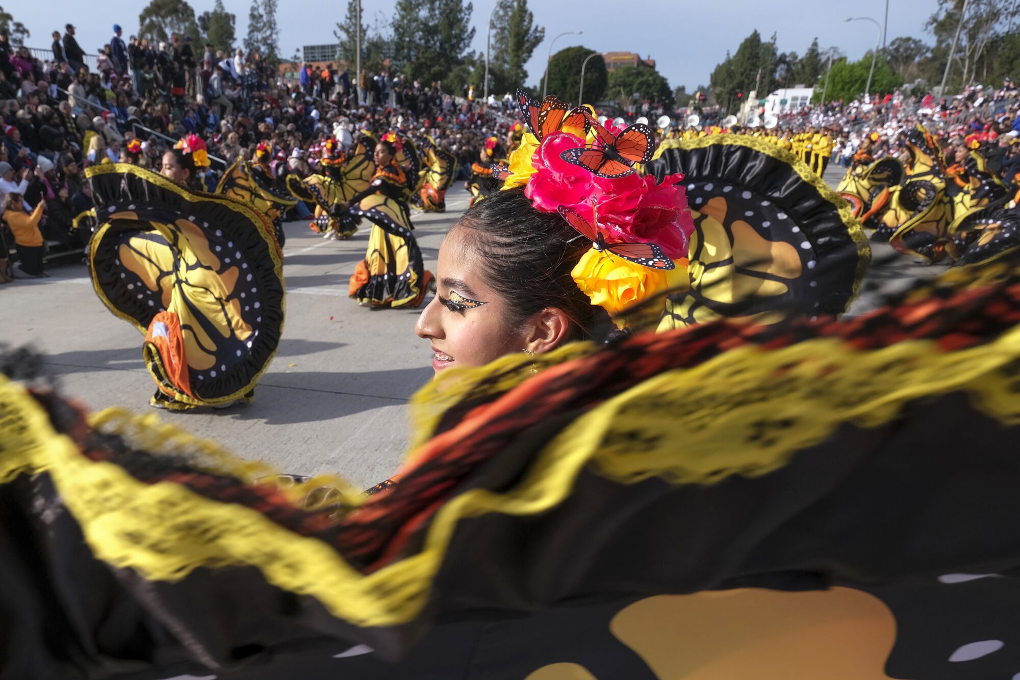 Dancers in butterfly costumes at the Rose Parade.
