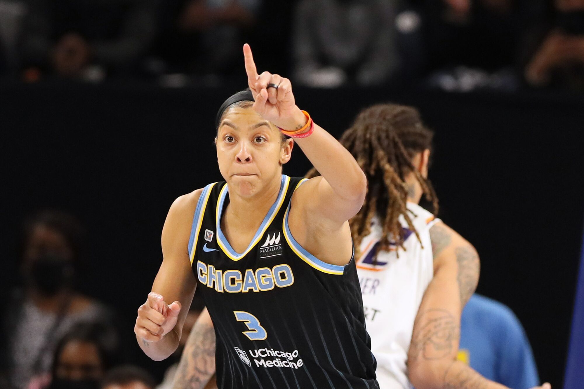 Candace Parker holds up one finger and reacts after scoring during Game 3 of the WNBA Finals