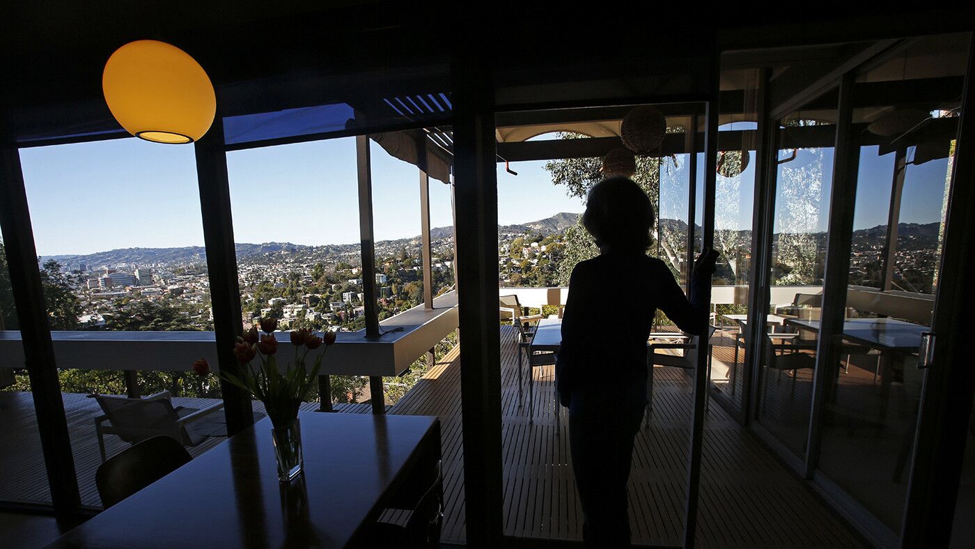 Ileene Bernard looks at the Hollywood Hills from the Raul Garduno-designed Silver Lake home she and husband Herbert Bernard have lived in since 1965.