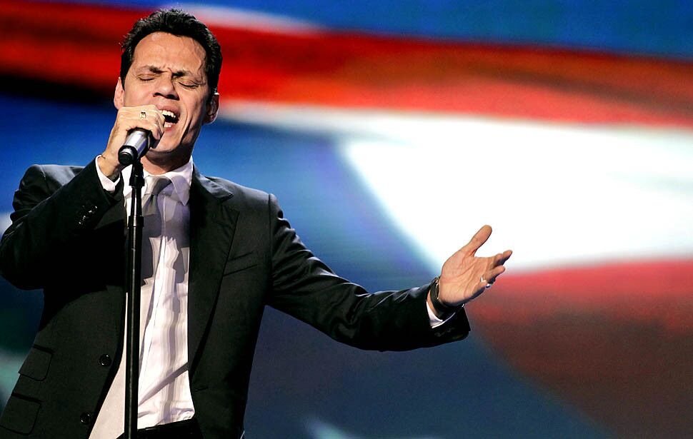 Marc Anthony sings the national anthem at the Democratic National Convention at Time Warner Cable Arena in Charlotte, N.C.