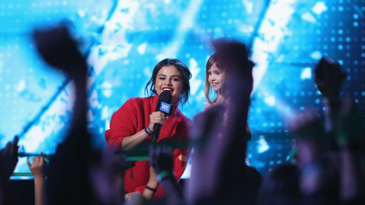 Selena Gomez speaks onstage at "We Day California" at the Forum, which was taped on April 19 in Inglewood.