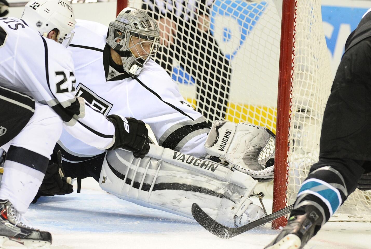 Kings goalie Jonathan Quick makes a save on a shot by San Jose Sharks forward Patrick Marleau during the second period of Game 7 of the Western Conference quarterfinals. The shot was reviewed and was ruled no goal.