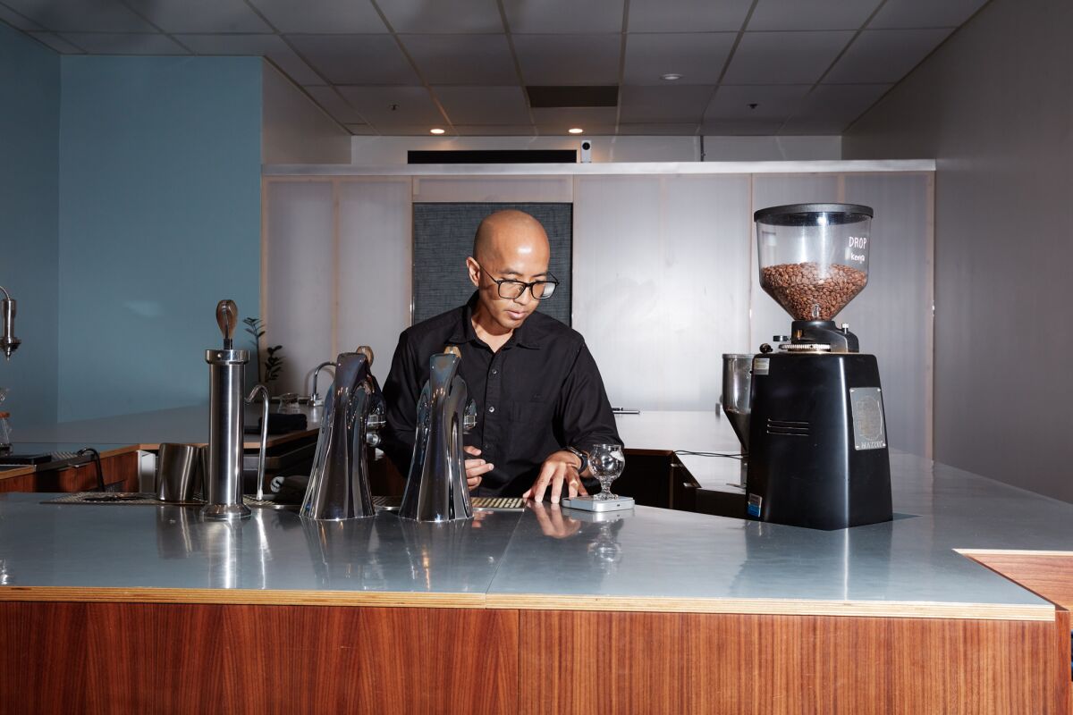 Jack Benchakul behind the bar at Endorffeine