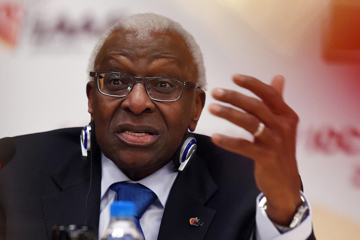 Lamine Diack speaks during an Aug. 21 news conference in Beijing ahead of the 2015 IAAF world championships.