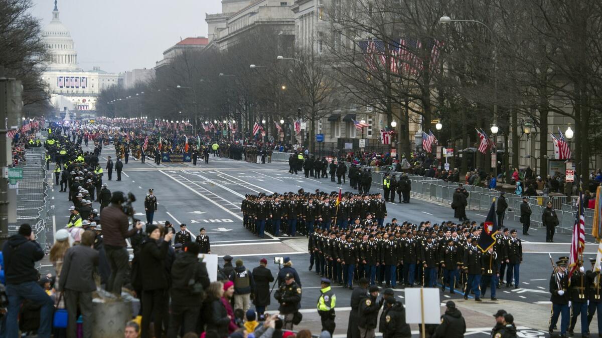 Military units participate in the presidential inaugural parade from the Capitol to the White House on Jan. 20, 2017.