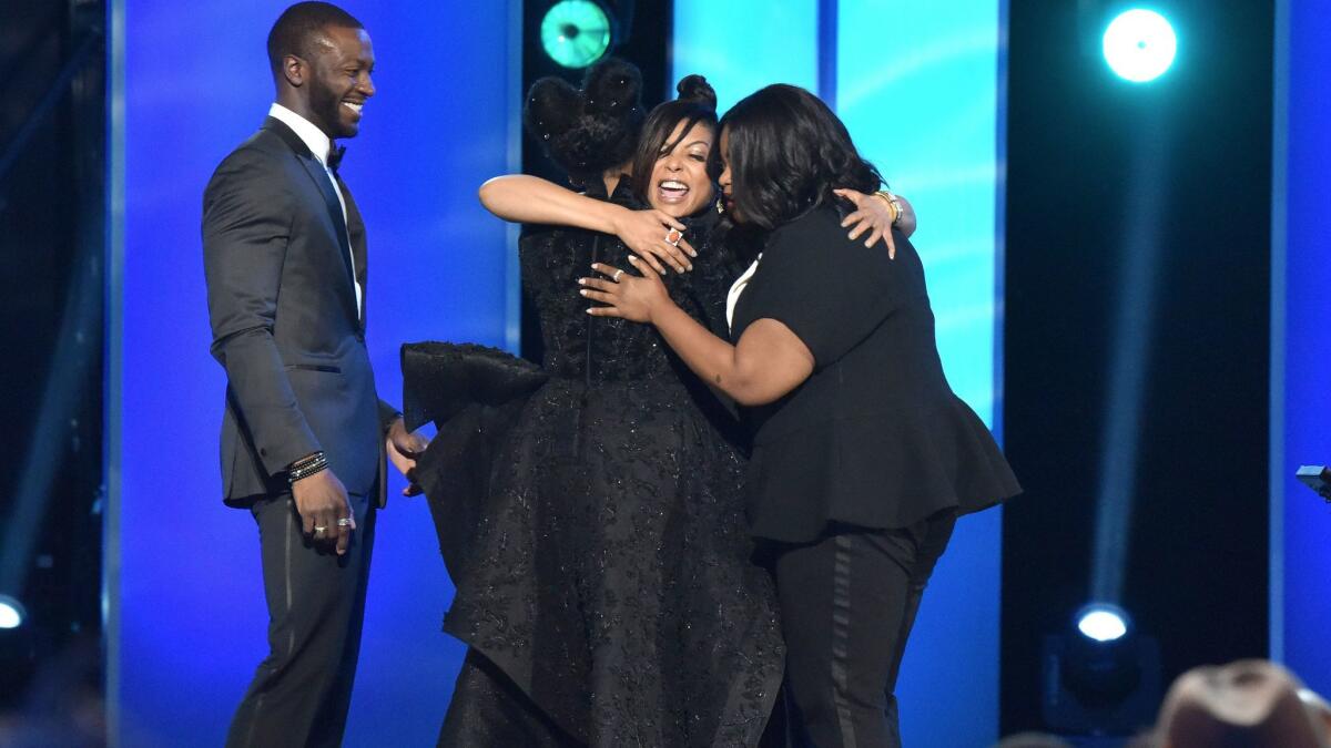 Actors Aldis Hodge, Janelle Monae, Taraji P. Henson, and Octavia Spencer accept the award for outstanding motion picture for "Hidden Figures" onstage at the 48th NAACP Image Awards.