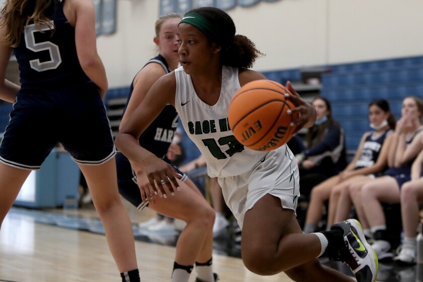 Sage HillOs Zoie Lamkin competes against Newport Harbor during the first half in the Corona del Mar Tip-off Tournament on Tuesday in Newport Beach.