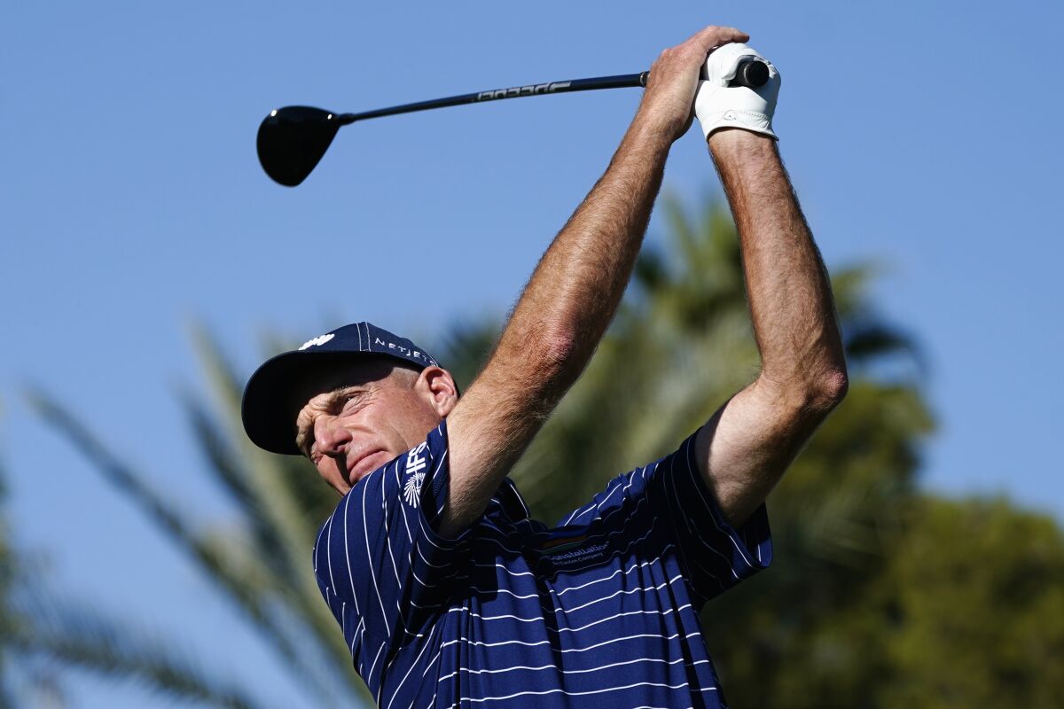 Jim Furyk hits his tee shot at the fourth hole during the third round of the Charles Schwab Cup Championship golf tournament Saturday, Nov. 13, 2021, in Phoenix. (AP Photo/Ross D. Franklin)