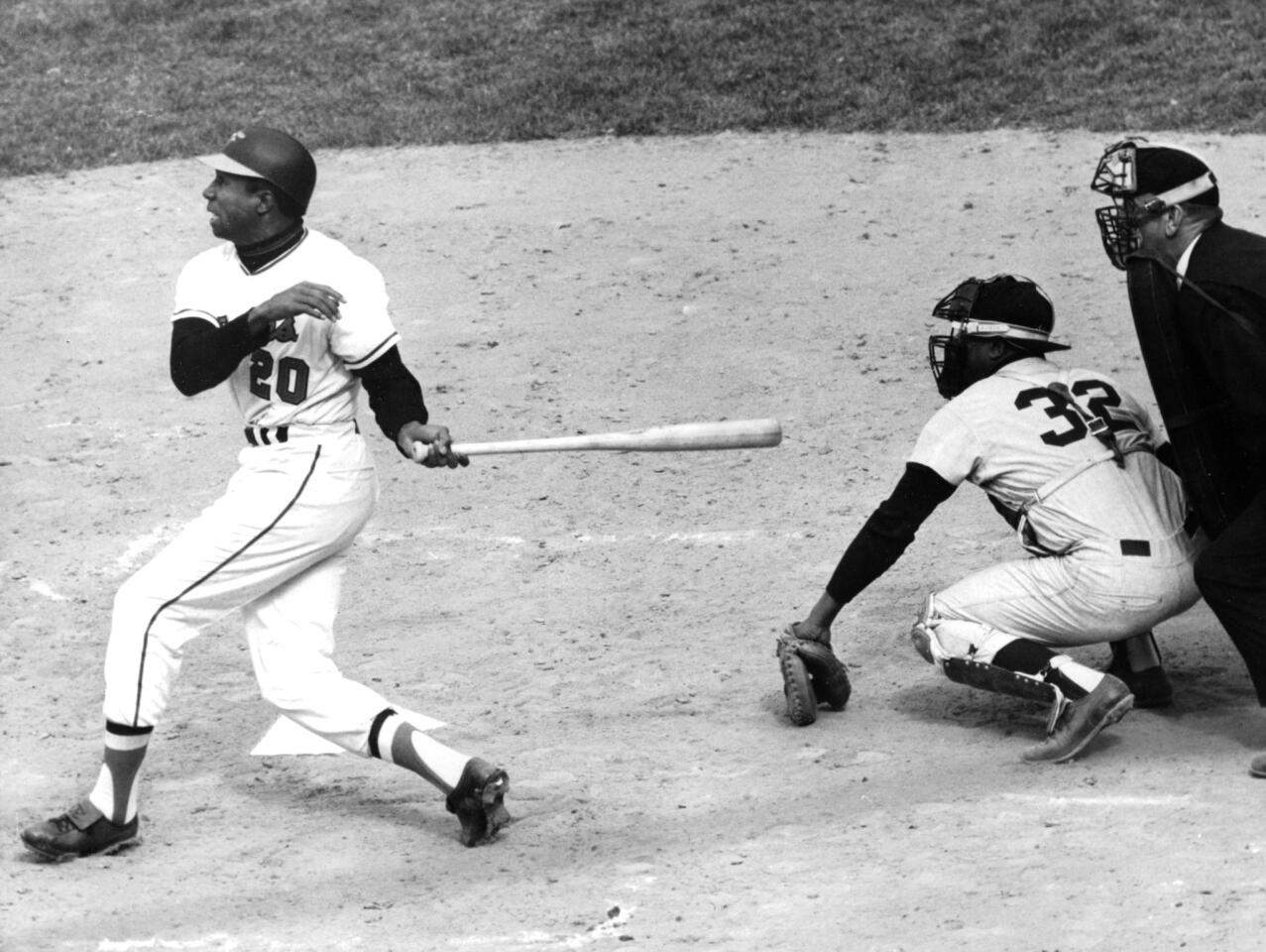 Orioles' Frank Robinson hits a homer in the ninth inning against New York Yankees on April 15, 1966.
