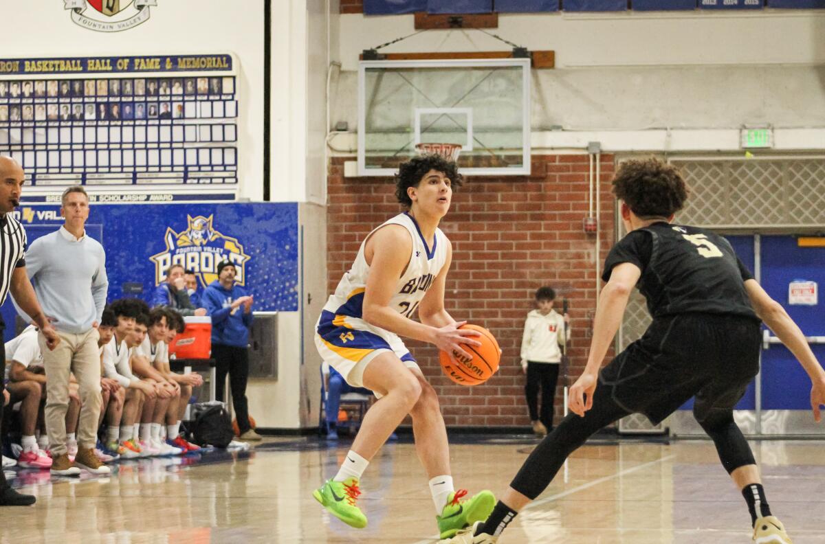 Fountain Valley's Aaron DeSantiago pulls up for a shot attempt during Tuesday's game.