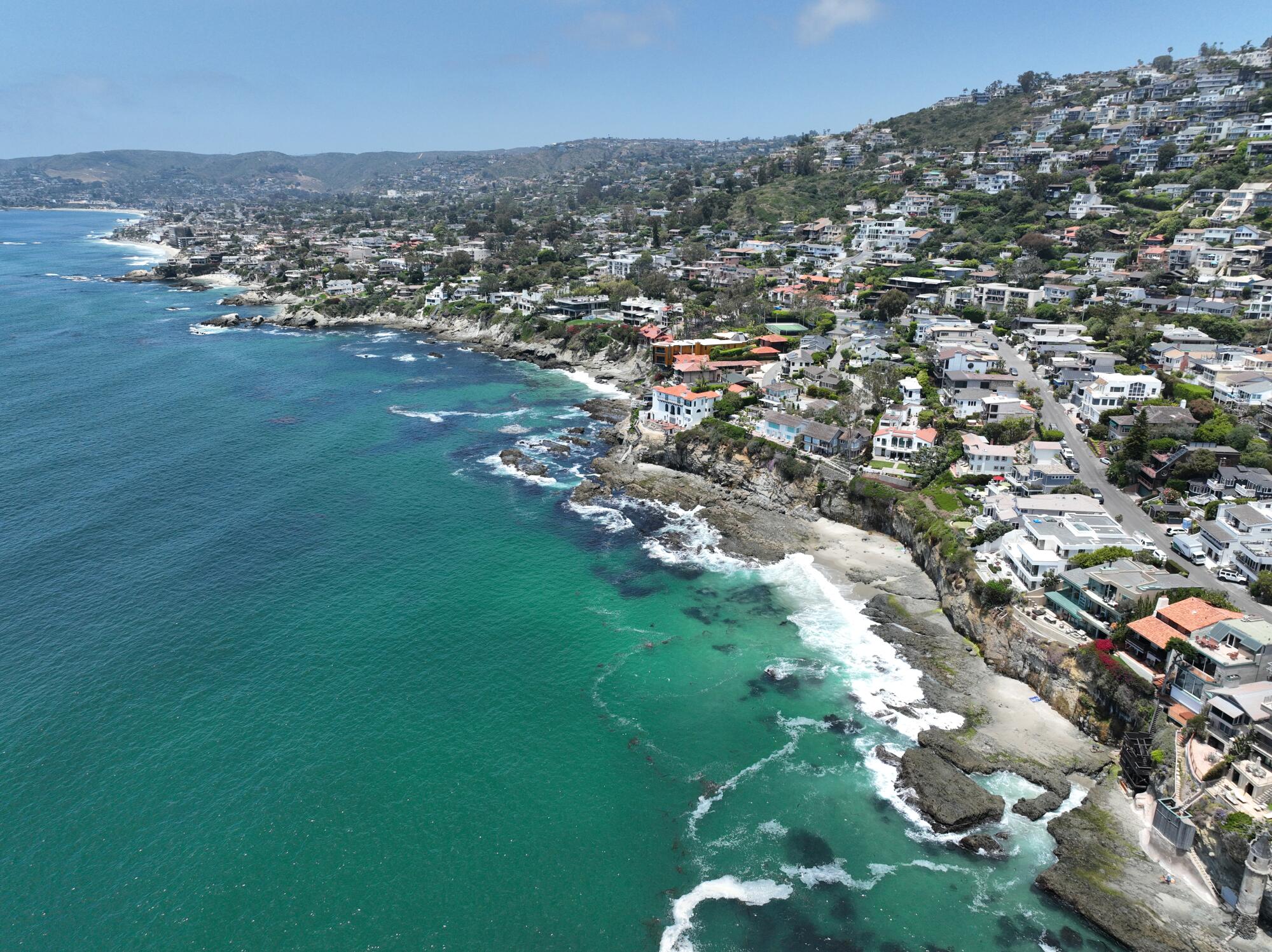 Limited pockets of sand dot the shoreline in Laguna Beach.