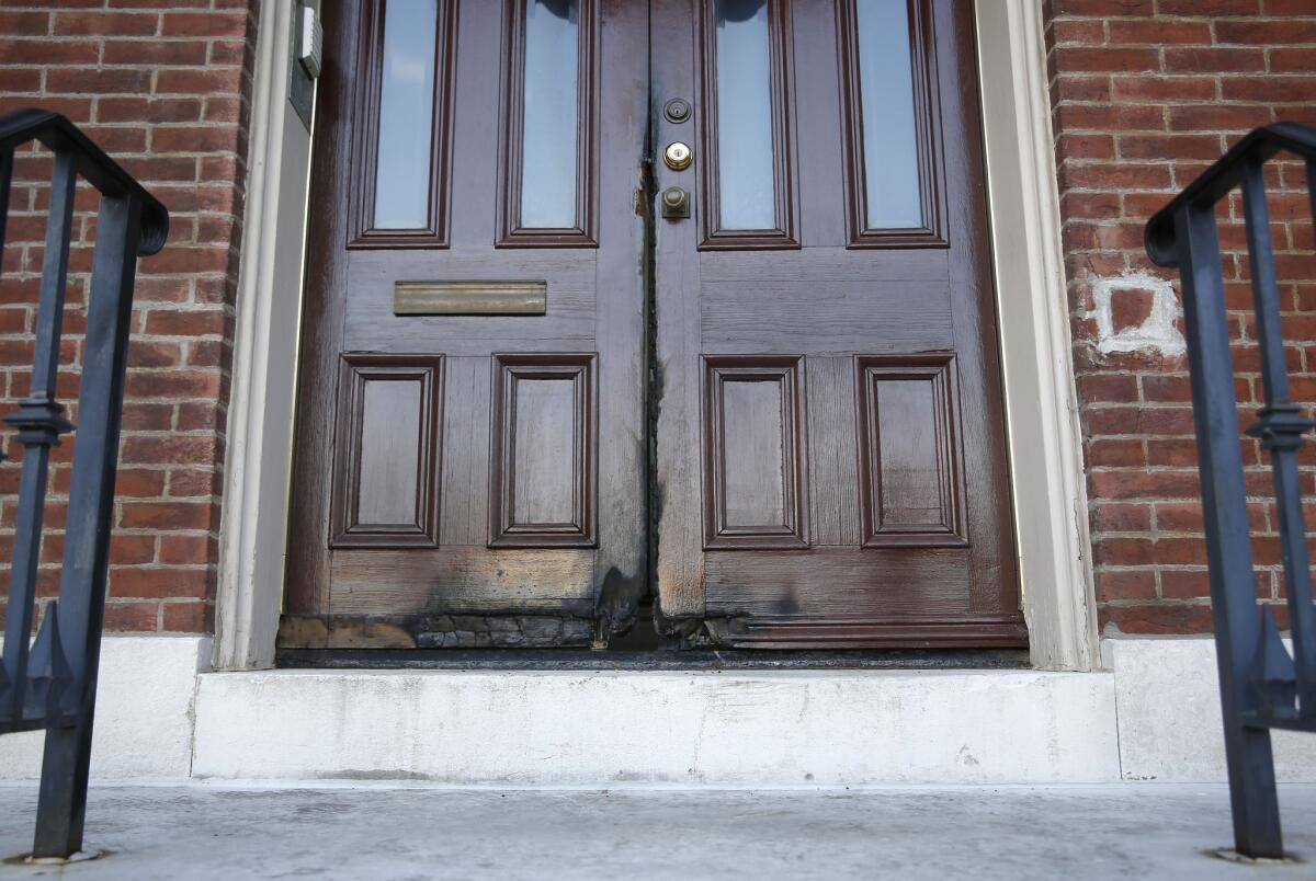 Rectory doors at the Shrine of St. Joseph church in St. Louis were damaged by fire on Oct. 22, 2015.