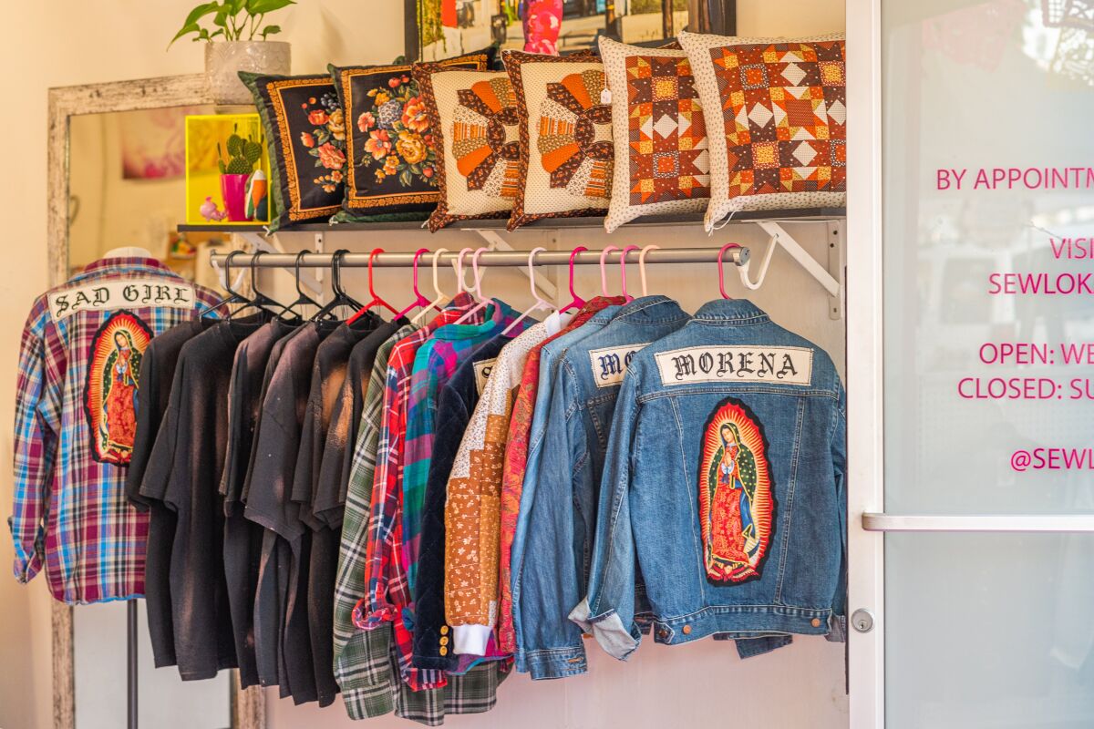 Sew Loka's "Chicana grunge" aesthetic includes denim jackets, distressed T-shirts and flannels.