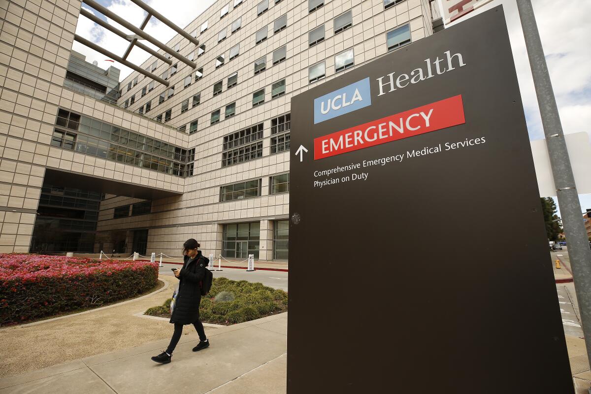 Tents have been erected at the Saperstein Emergency Center entrance to the Ronald Regan UCLA Medical Center on the Westwood campus as hospitals are straining under coronavirus but the big wave hasn't hit yet.