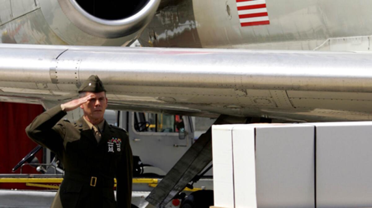 GRIM DUTY: In Taking Chance, Kevin Bacon plays a Marine escorting a fallen Marines casket to his hometown.