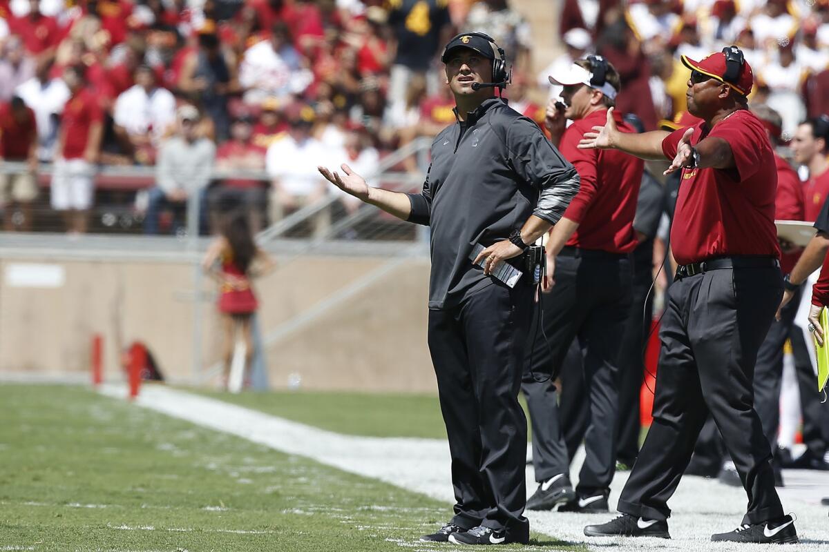 USC Coach Steve Sarkisian's team could also be contending with the rain when the Trojans play Boston College on Saturday.