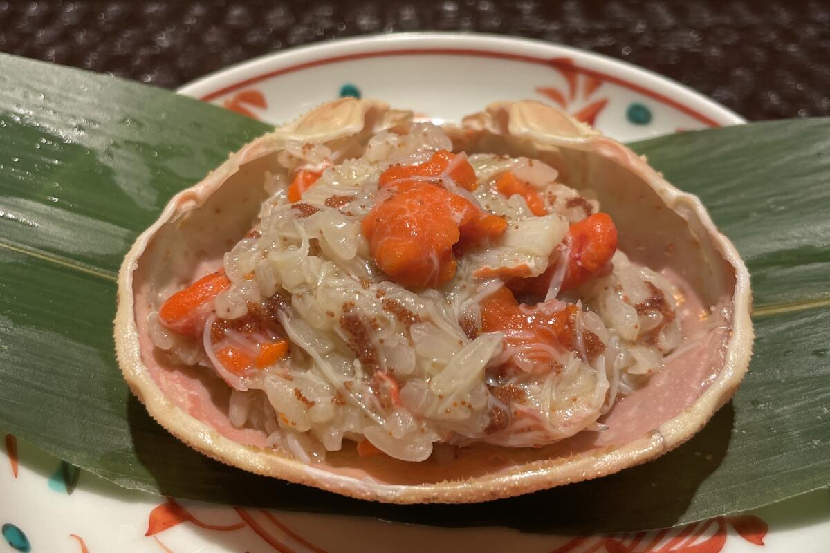 Seko gani female snow crabs with uchiko and sotoko eggs and kani miso with rice porridge from Hayato.