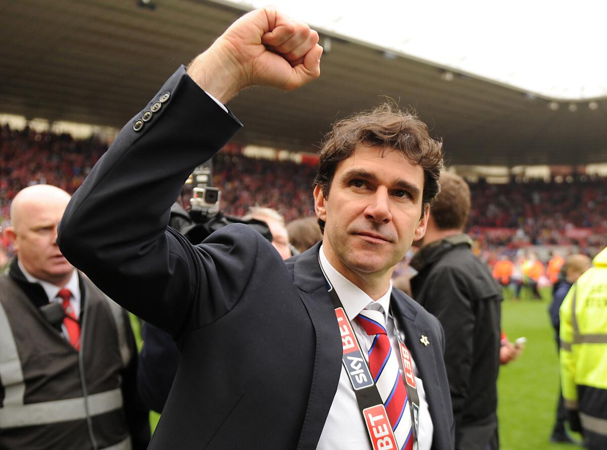 Middlesbrough Manager Aitor Karanka celebrates after assuring his club's promotion to the Premier League with a 1-1 draw with Brighton on May 7.