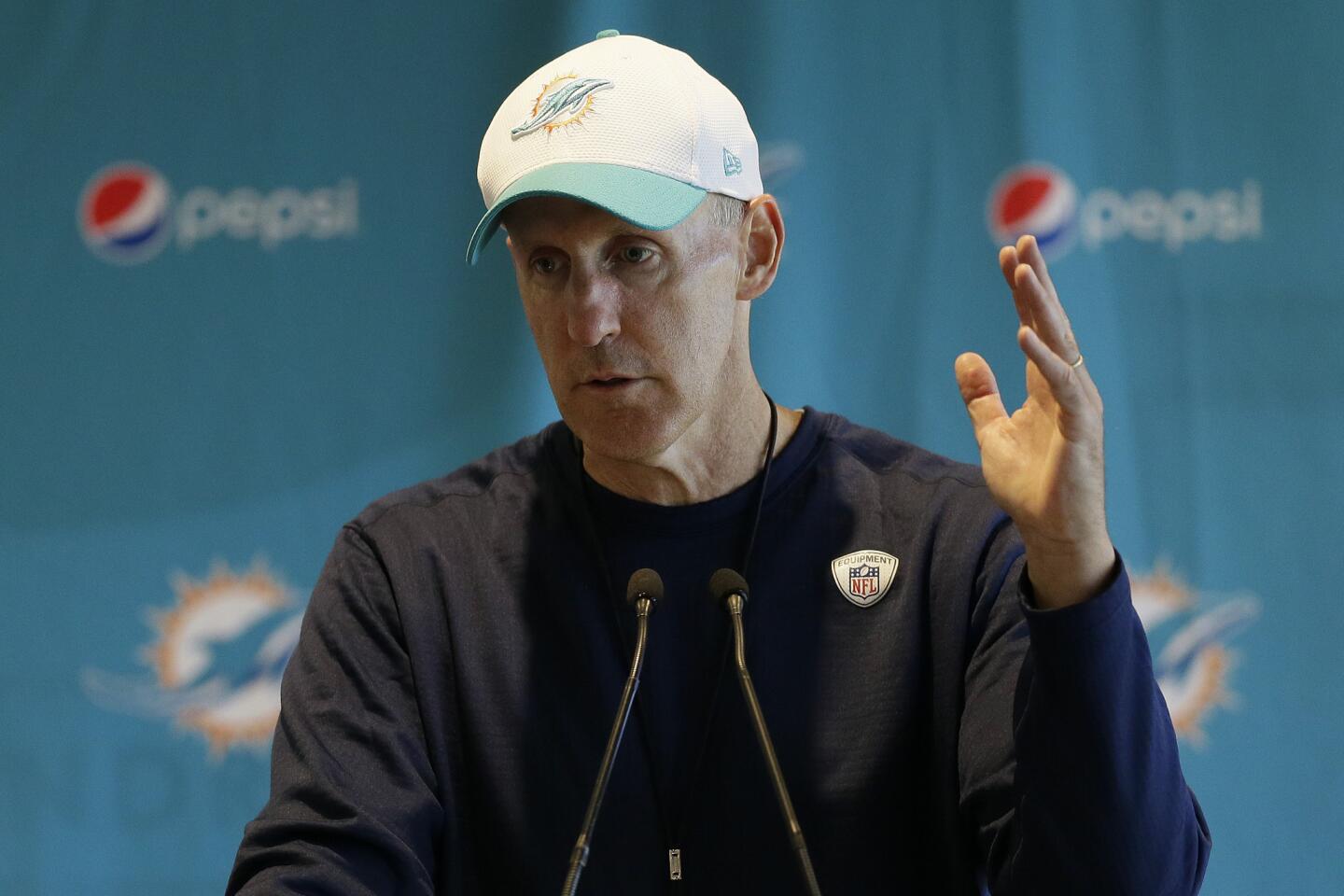 Miami Dolphins head coach Joe Philbin speaks during a press conference at Allianz Park in London, Friday Oct. 2, 2015. The Dolphins are preparing for an NFL football game against the New York Jets at London's Wembley stadium on Sunday. (AP Photo/Tim Ireland)