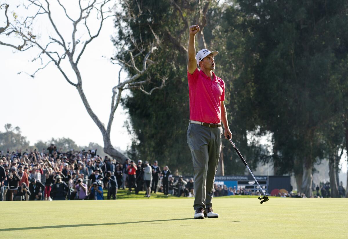 Adam Scott celebrates after winning the Genesis Invitational at Riviera Country Club in Pacific Palisades on Sunday.