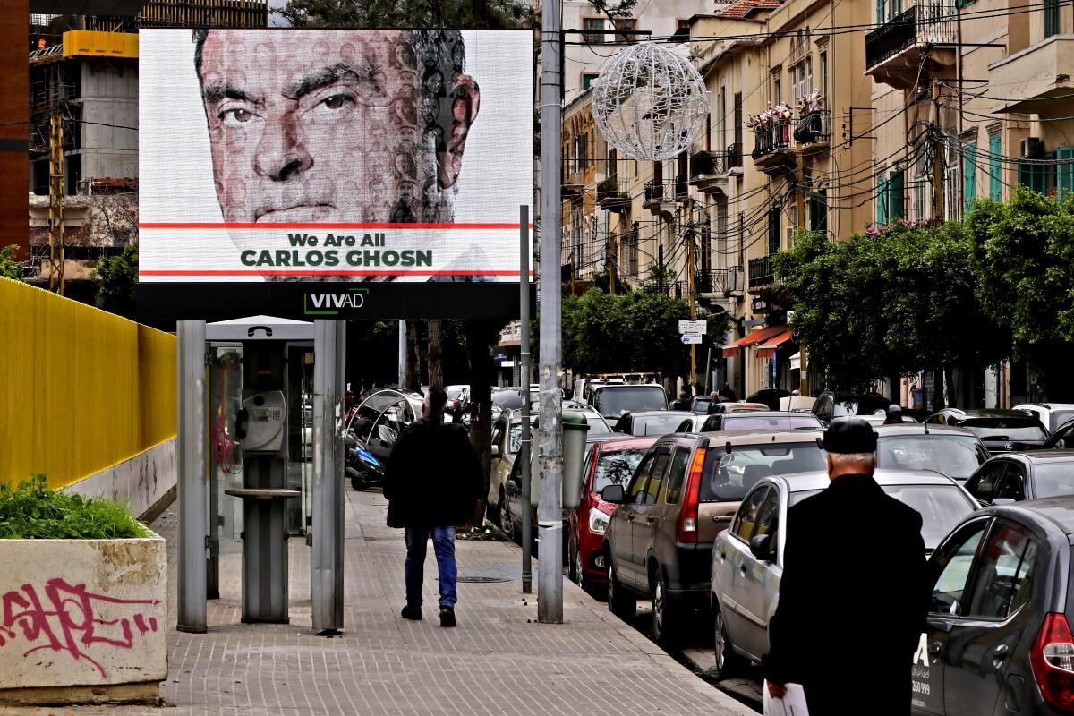 A portrait of ousted Nissan Chairman Carlos Ghosn on a billboard in Beirut in 2018. 