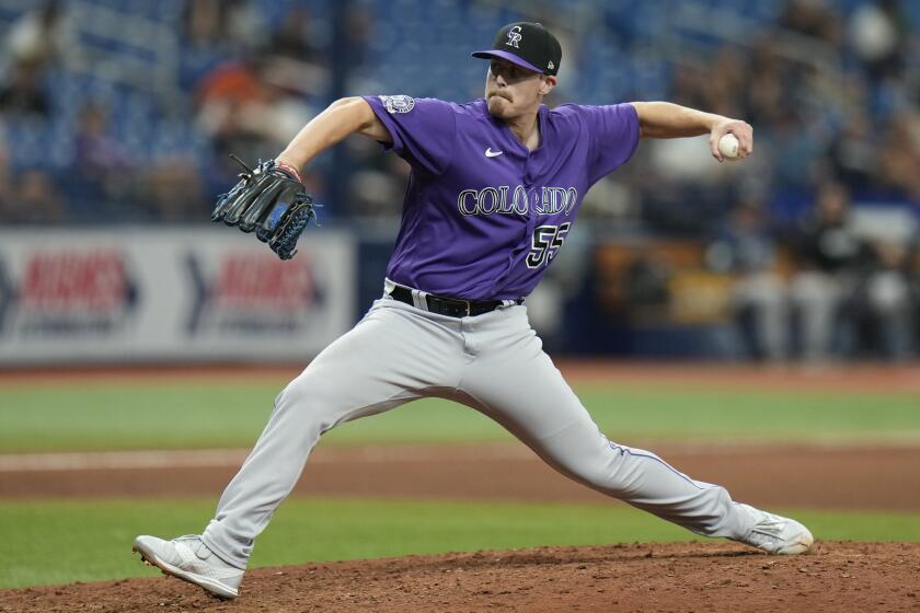 FILE - Colorado Rockies relief pitcher Justin Bruihl throws against the Tampa Bay Rays during the eighth inning of a baseball game Thursday, Aug. 24, 2023, in St. Petersburg, Fla. The Pirates signed Bruihl on Thursday, June 6, 2024, hoping the left-hander can help stabilize a bullpen that's been shaky at times during the early part of the season.(AP Photo/Chris O'Meara, File)