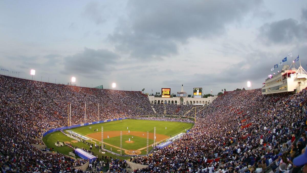 At retro night in 2008, the Dodgers take on the Boston Red Sox at the Los Angeles Memorial Coliseum — the long-ago home of the Dodgers.