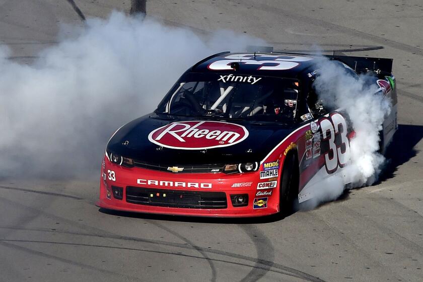 Austin Dillon, driver of the No. 33 Rheem Chevrolet, celebrates with a burnout after winning the NASCAR Xfinity Series Boyd Gaming 300 at Las Vegas Motor Speedway on Saturday.