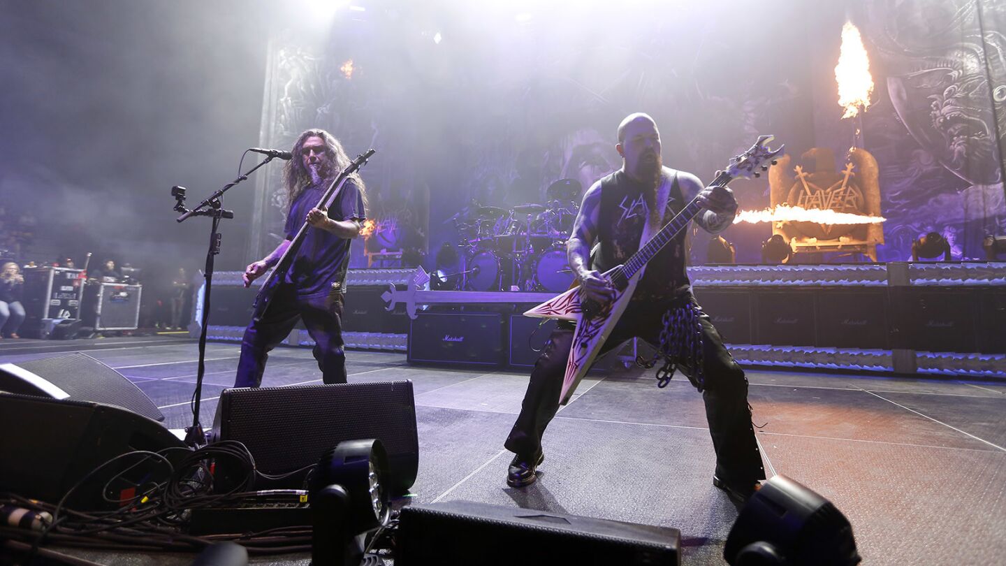 Bassist and singer Tom Araya, left, and guitarist Kerry King of the band Slayer play during the band's opening night of their farewell tour in San Diego on May 10, 2018. (Photo by K.C. Alfred/ San Diego Union -Tribune)